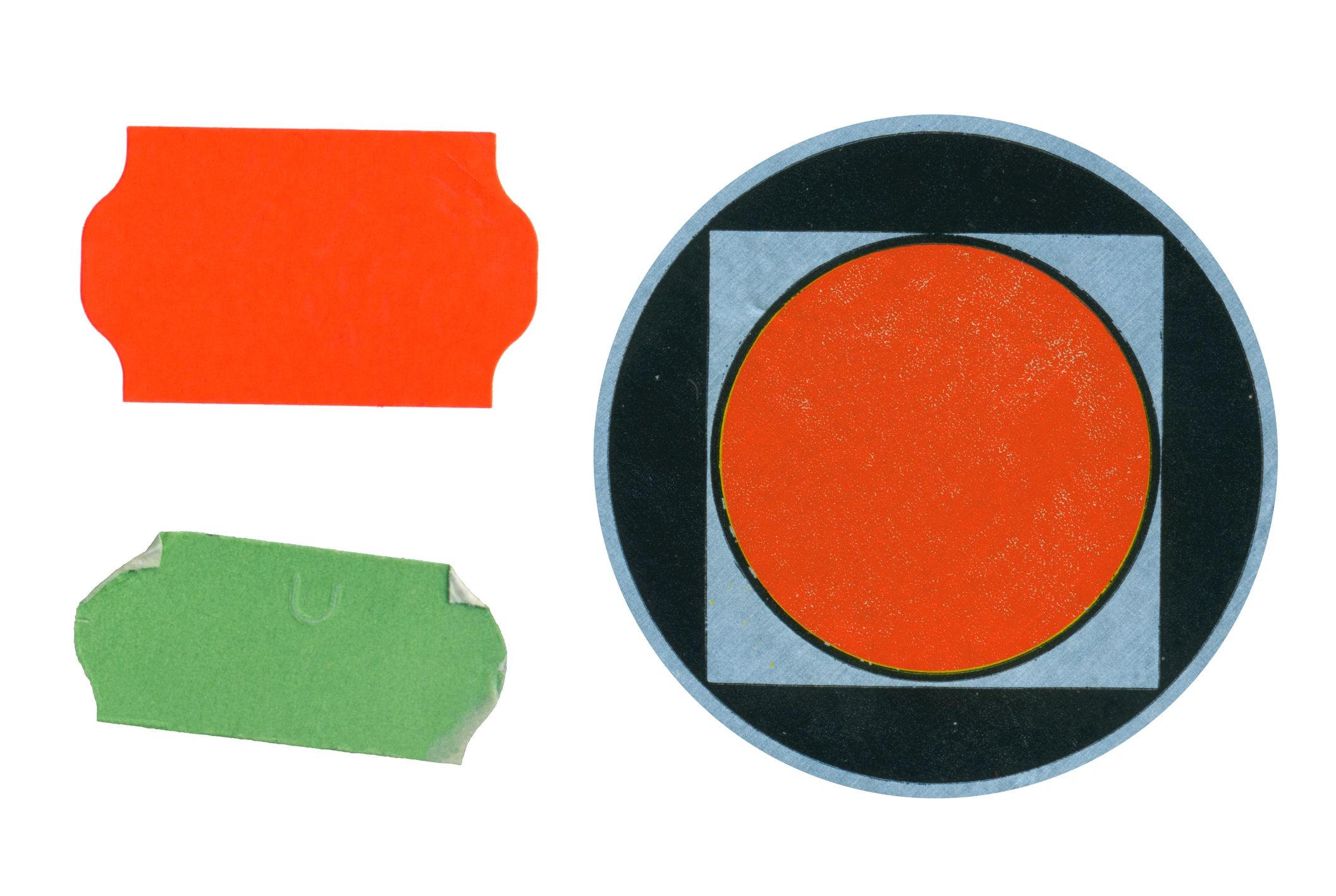 Close-up of a sheet of blank adhesive labels on a white background.